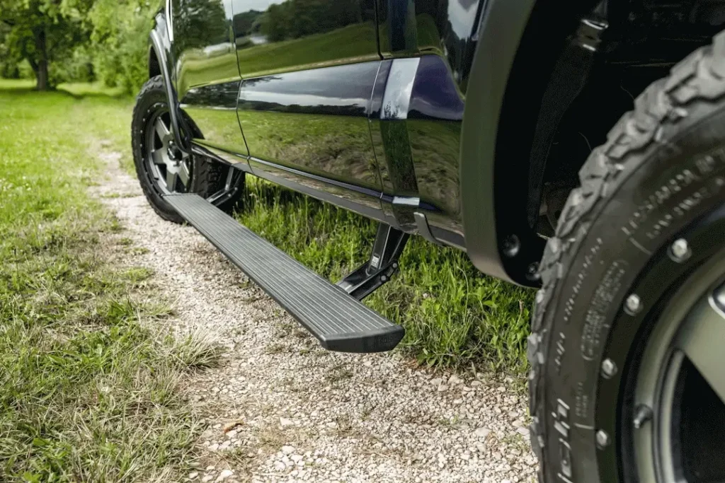 Power folding running boards on a ram 1500