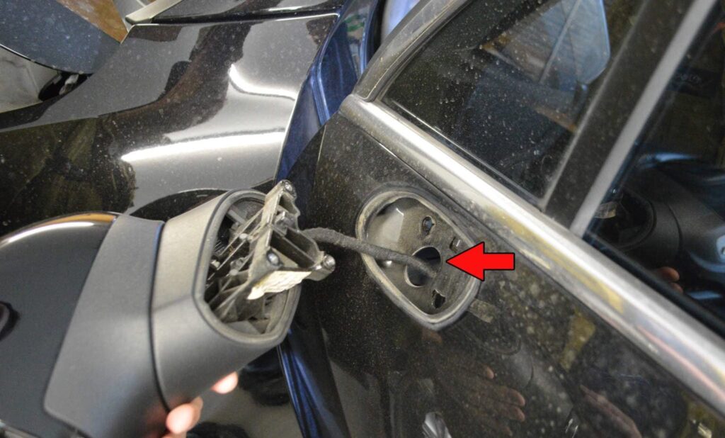removing the side mirror from a Porsche 911